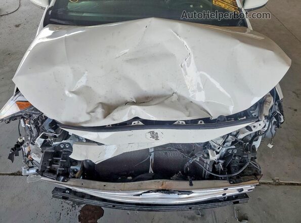 JTDBCMFE5R3030424 2024 TOYOTA COROLLA White Vista interior trasera