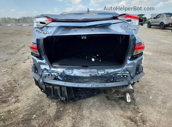 JTDBCMFE5R3067683 2024 TOYOTA COROLLA Blue Rear view