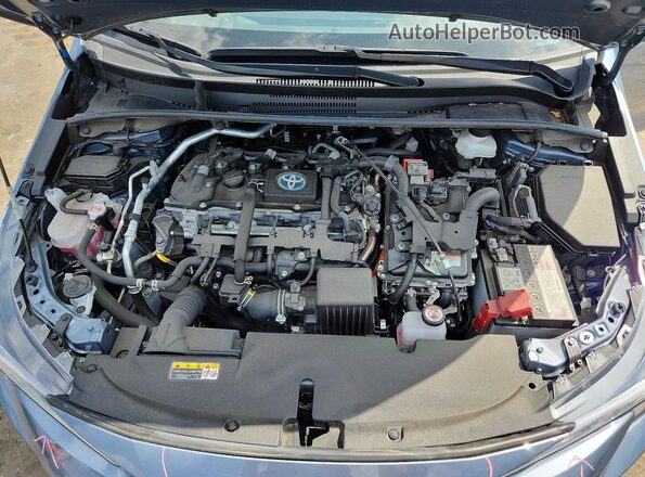 JTDBCMFE5R3067683 2024 TOYOTA COROLLA Blue Rear interior view
