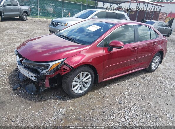 JTDBCMFE5T3145225 2026 TOYOTA COROLLA HYBRID Red წინა მარცხენა ხედი სამი მეოთხედიდან
