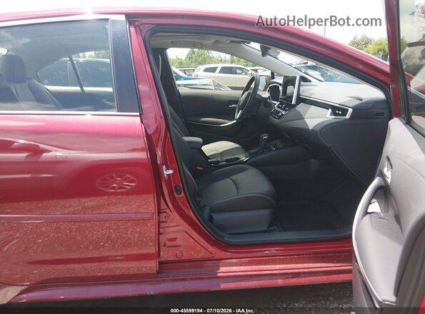 JTDBCMFE5T3145225 2026 TOYOTA COROLLA HYBRID Red წინა სალონის ხედი