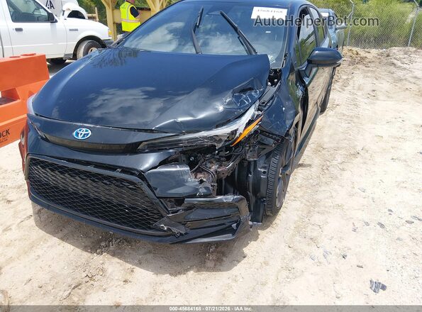 JTDBCMFE6P3006436 2023 TOYOTA COROLLA Black Front view
