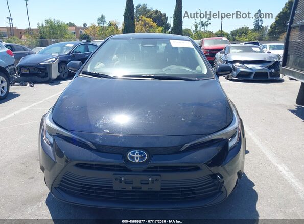 JTDBCMFE6S3098818 2025 TOYOTA COROLLA Black Սալոնի հետևի տեսք