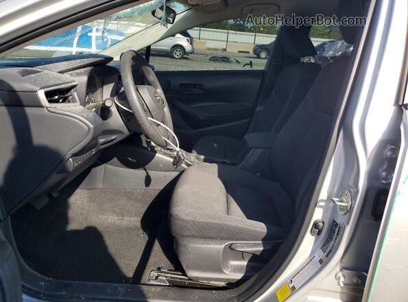 JTDBCMFE6S3109154 2025 TOYOTA COROLLA Серебряный Вид салона спереди