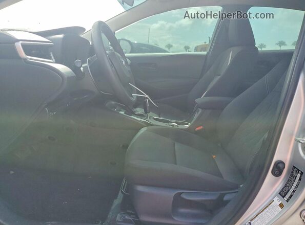 JTDBCMFE7PJ006912 2023 TOYOTA COROLLA Silver Front interior view