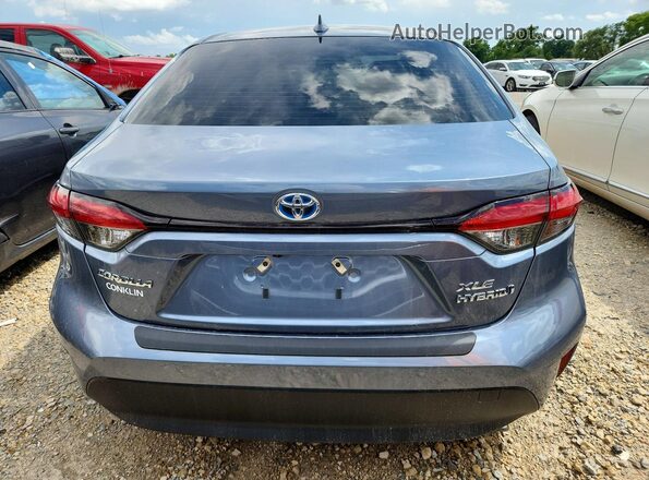 JTDBCMFE7R3036631 2024 TOYOTA COROLLA Синий Вид сзади
