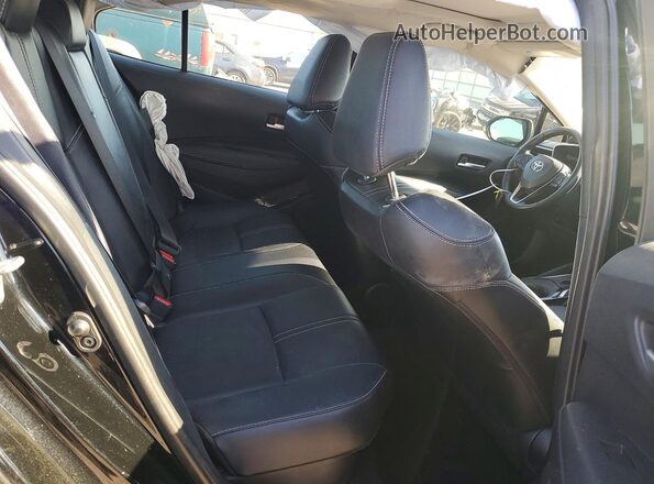 JTDBCMFE8P3008916 2023 TOYOTA COROLLA Black Vista de los asientos traseros