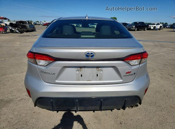 JTDBCMFE8R3061926 2024 TOYOTA COROLLA Silver Rear view
