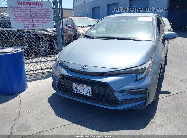 JTDBCMFE8T3127138 2026 TOYOTA COROLLA HYBRID Light Blue Սարքավորումների վահանակի տեսք