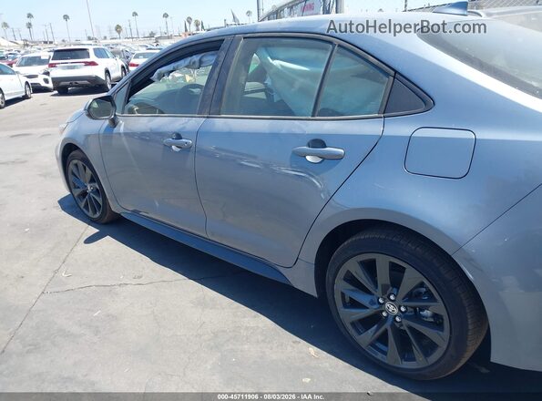 JTDBCMFE8T3127138 2026 TOYOTA COROLLA HYBRID Light Blue Սալոնի 360 աստիճան տեսք