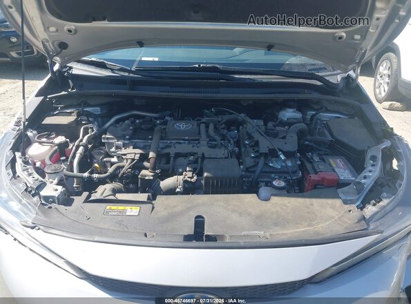 JTDBCMFE9RJ027702 2024 TOYOTA COROLLA Silver Rear view