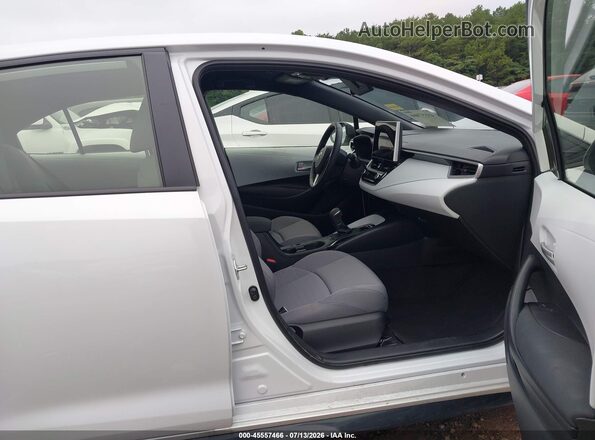 JTDBCMFE9T3129755 2026 TOYOTA COROLLA HYBRID White Widok wnętrza z przodu
