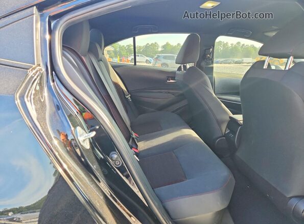 JTDBCMFEXP3010957 2023 TOYOTA COROLLA Black Vista de los asientos traseros