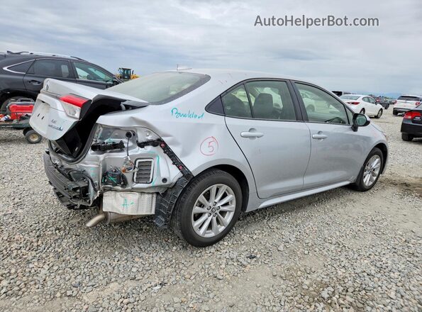 JTDBCMFEXRJ024551 2024 TOYOTA COROLLA Silver Trasero derecho