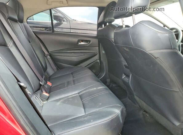 JTDBCMFEXS3070309 2025 TOYOTA COROLLA Red Հետևի նստատեղերի տեսք