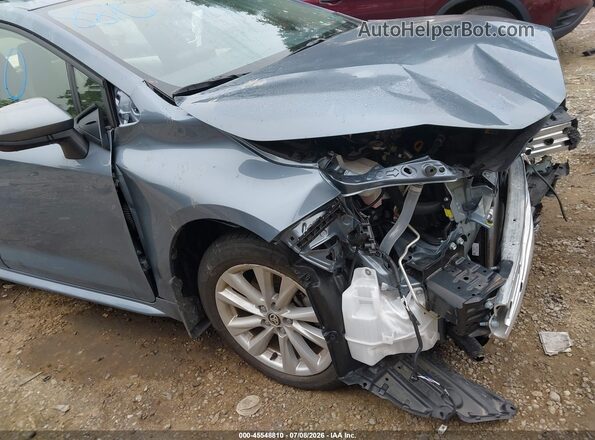 JTDBDMHE1T3030020 2026 TOYOTA COROLLA HYBRID Light Blue 