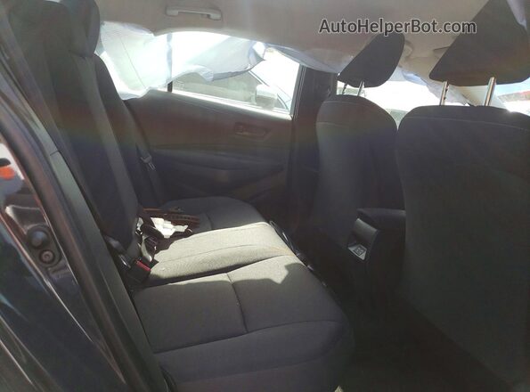 JTDBDMHE2S3018117 2025 TOYOTA COROLLA Charcoal Rear seats view