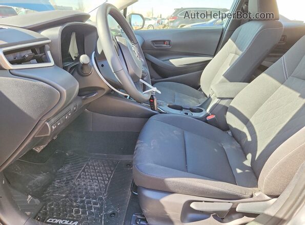 JTDBDMHE8S3023712 2025 TOYOTA COROLLA Серебряный Вид салона спереди