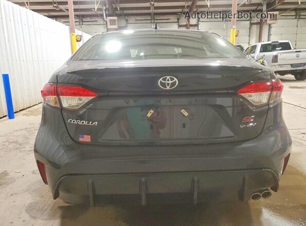 JTDBDMHE8T3029849 2026 TOYOTA COROLLA Gray Rear view