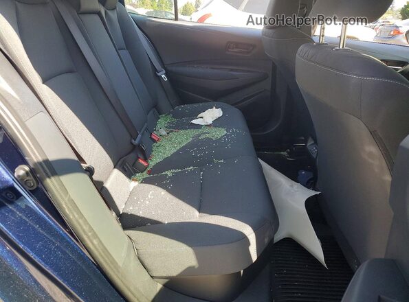 JTDBDMHE9T3033859 2026 TOYOTA COROLLA Blue Rear seats view