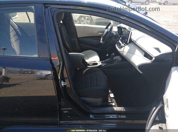 JTDEAMDE2MJ006401 2021 TOYOTA COROLLA Black Front interior view