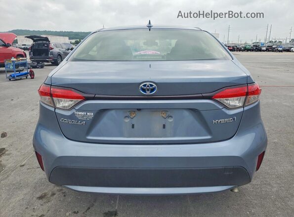 JTDEAMDE4MJ006674 2021 TOYOTA COROLLA Silver Rear view