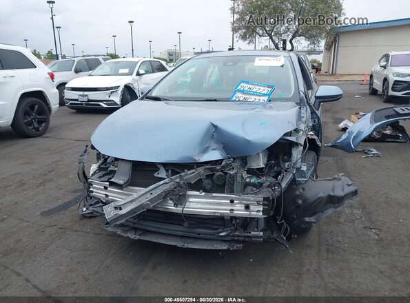 JTDEAMDE7N3013141 2022 TOYOTA COROLLA Light Blue Սալոնի հետևի տեսք