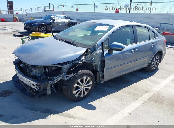 JTDEAMDE7NJ052968 2022 TOYOTA COROLLA Silver Vista tres cuartos delantera izquierda