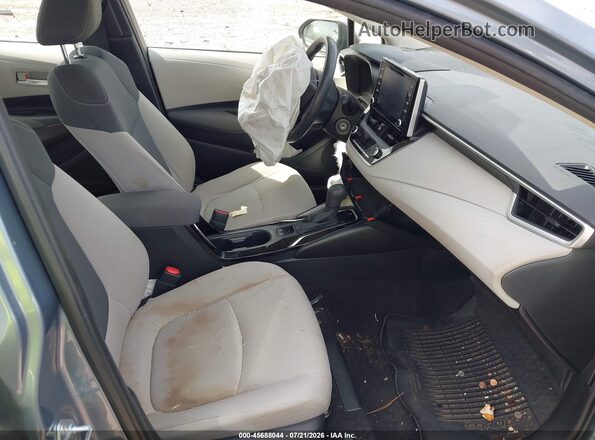 JTDEPMAE3MJ176110 2021 TOYOTA COROLLA Light Blue Вид салона спереди