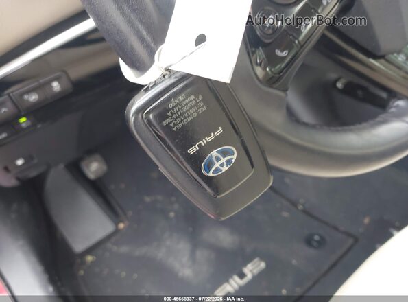 JTDKAMFU0M3144434 2021 TOYOTA PRIUS Red Առջևի վահանակի տեսք
