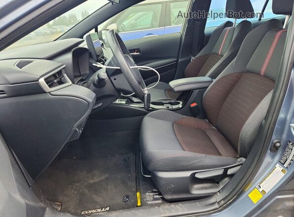 JTDP4MCE8PJ102622 2023 TOYOTA COROLLA Blue Front interior view