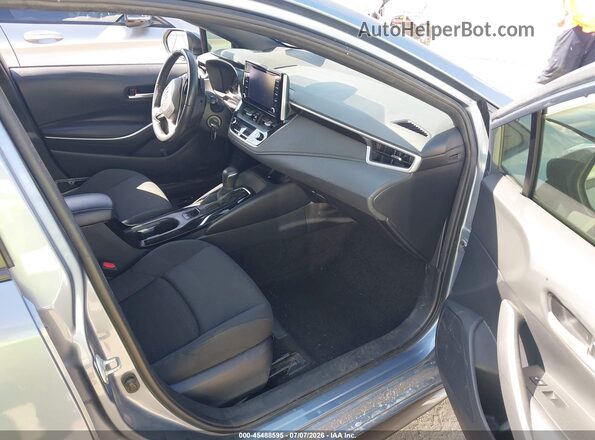 JTDS4MCE1MJ055133 2021 TOYOTA COROLLA Gray Front interior view