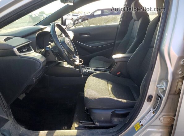 JTDS4MCE1MJ055178 2021 TOYOTA COROLLA Silver Front interior view