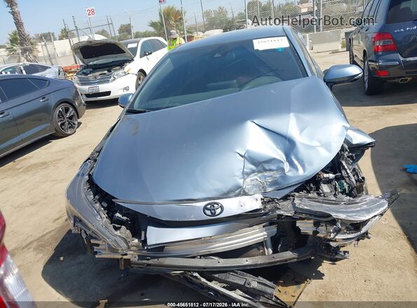 JTDS4MCE6N3506014 2022 TOYOTA COROLLA Light Blue Vista interior trasera