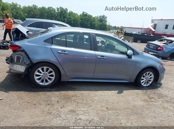 JTDVPMAE9NJ205773 2022 TOYOTA COROLLA Light Blue Widok wnętrza z tyłu