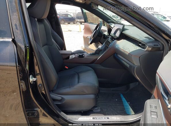 JTEAAAAH9PJ132931 2023 TOYOTA VENZA Черный Вид салона спереди