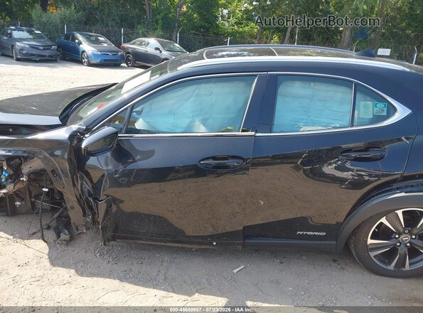JTHP9JBH9M2050451 2021 LEXUS UX 250H Black Rear interior view