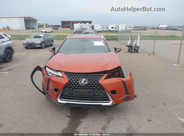 JTHU9JBH5K2017477 2019 LEXUS UX 250H Оранжевый Вид щитка приборов