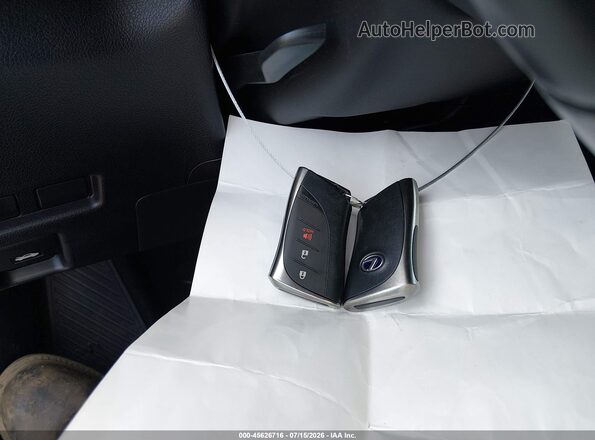 JTHU9JBH6K2016127 2019 LEXUS UX 250H Белый Вид панели приборов