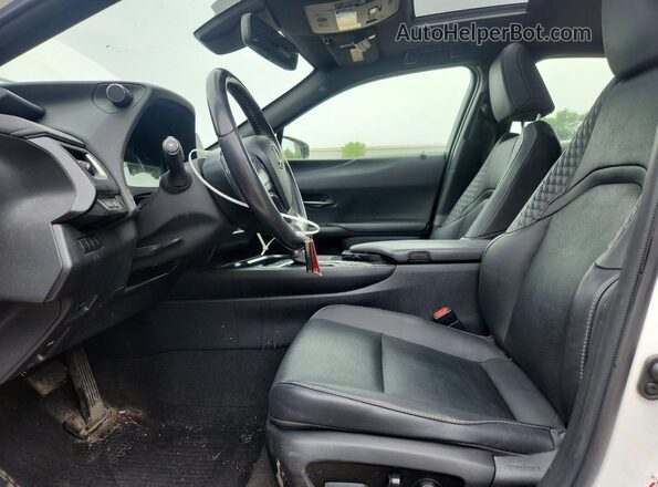 JTHU9JBH9K2007728 2019 LEXUS UX White Vista interior delantera