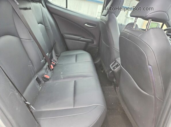 JTHU9JBH9K2007728 2019 LEXUS UX White Vista interior trasera