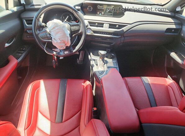 JTHU9JBHXK2018933 2019 LEXUS UX White Dashboard view