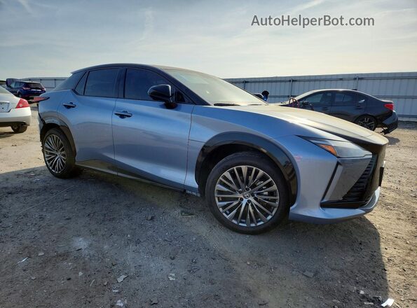 JTJAAAAB2PA001482 2023 LEXUS RZ Blue Delantero derecho