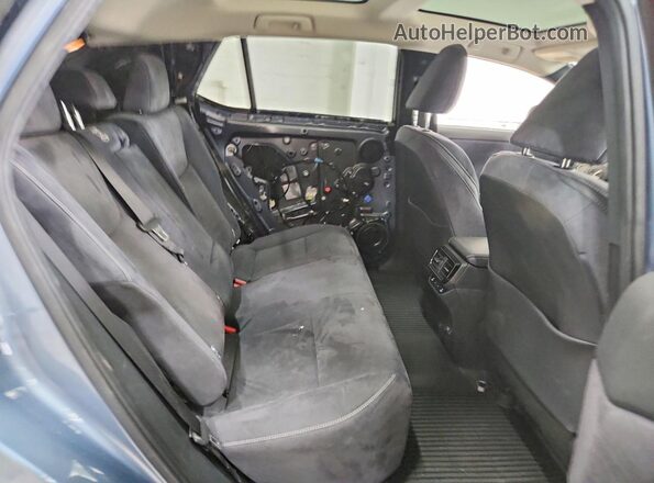 JTJAAAAB2PA001482 2023 LEXUS RZ Blue Vista interior trasera