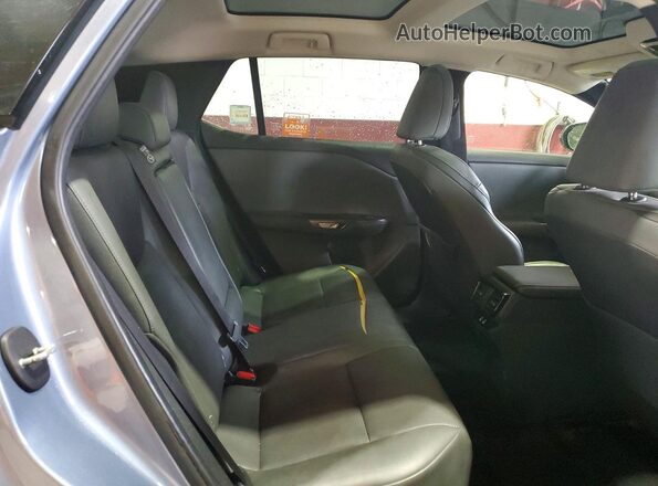 JTJAAAAB6PA013764 2023 LEXUS RZ Blue Vista interior trasera