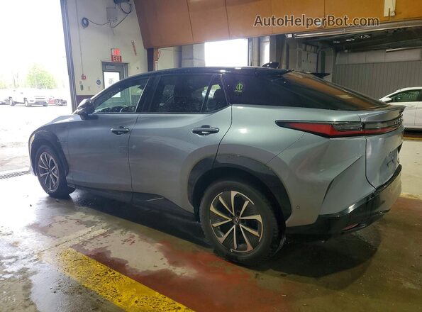 JTJAAAAB6PA013764 2023 LEXUS RZ Blue Trasero izquierdo