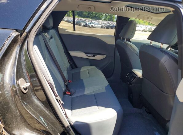 JTJAAAAB7SA031022 2025 LEXUS RZ Black Vista interior trasera