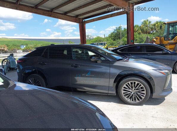 JTJAAAABXPA001567 2023 LEXUS RZ 450E Серый Вид задней части салона