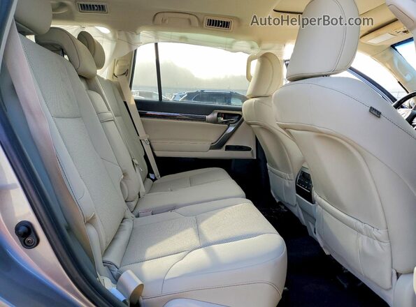 JTJAM7BX6P5341702 2023 LEXUS GX Tan Rear interior view