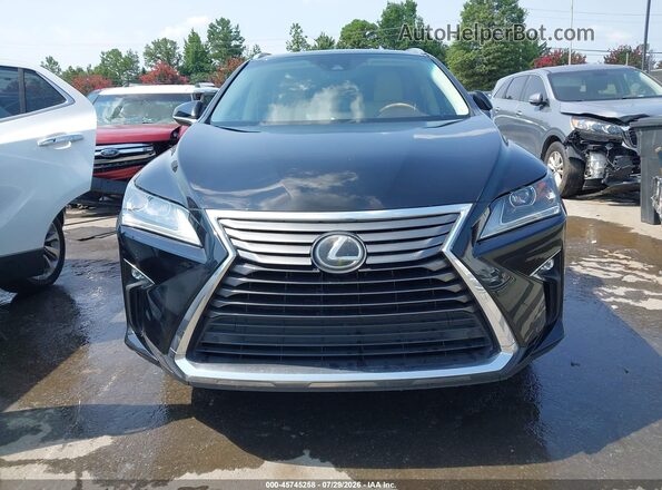 JTJBZMCA3H2019049 2017 LEXUS RX 350 Black Rear interior view
